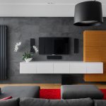 Белая подвесная тумба под телевизором в гостиной