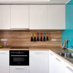 Finishing the apron with panels in the corner kitchen