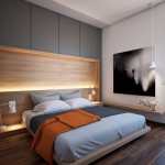 wardrobe above the bed in the bedroom design